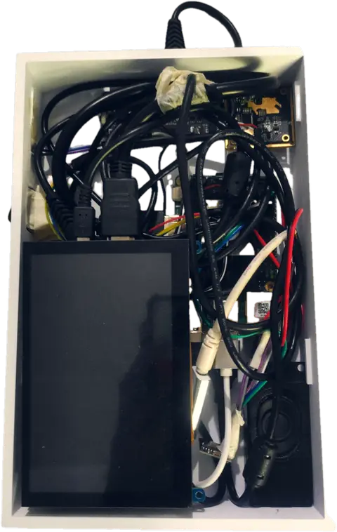 Buddie opened up: the board, speaker, camera and battery inside the case